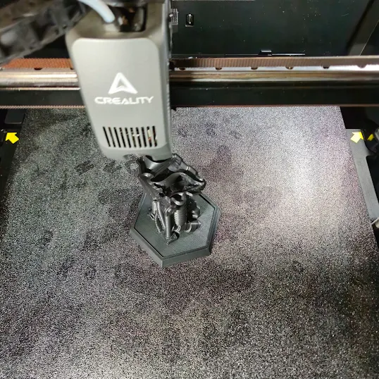 A Throwback Geeks piece being 3D printed on a Creality printer in the Digi Labs Core shop